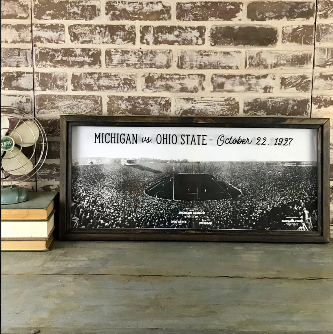 Framed reproduction photo of the 1927 Michigan vs. Ohio State football game, sold at Thistles in Pella, Iowa