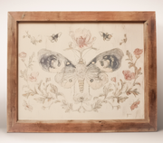 Large butterfly and floral canvas in a timberwood frame, sold at Thistles in Pella, Iowa