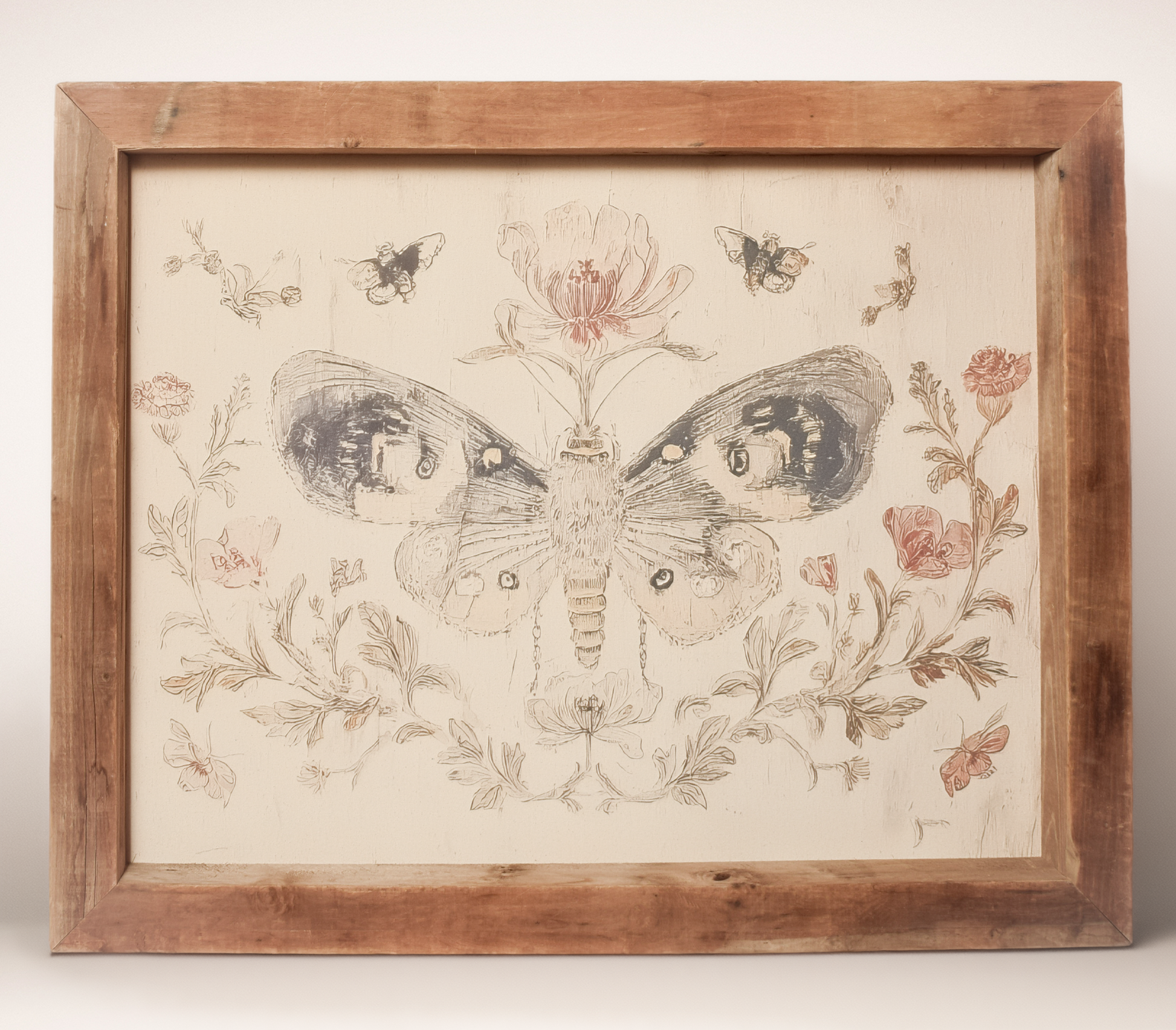 Large butterfly and floral canvas in a timberwood frame, sold at Thistles in Pella, Iowa