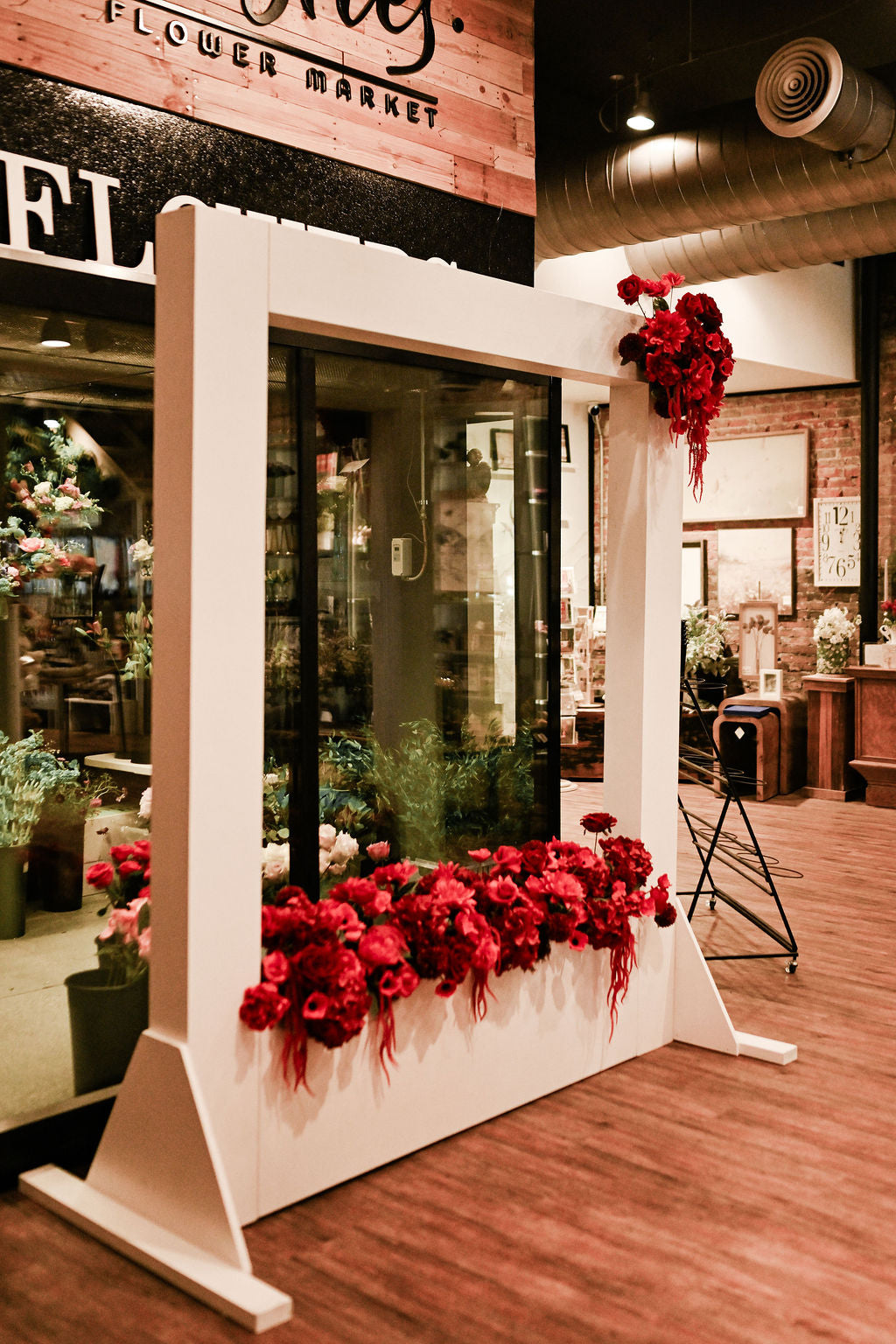 lifesize polaroid rental, with faux flowers, thistles flower market in Pella Iowa