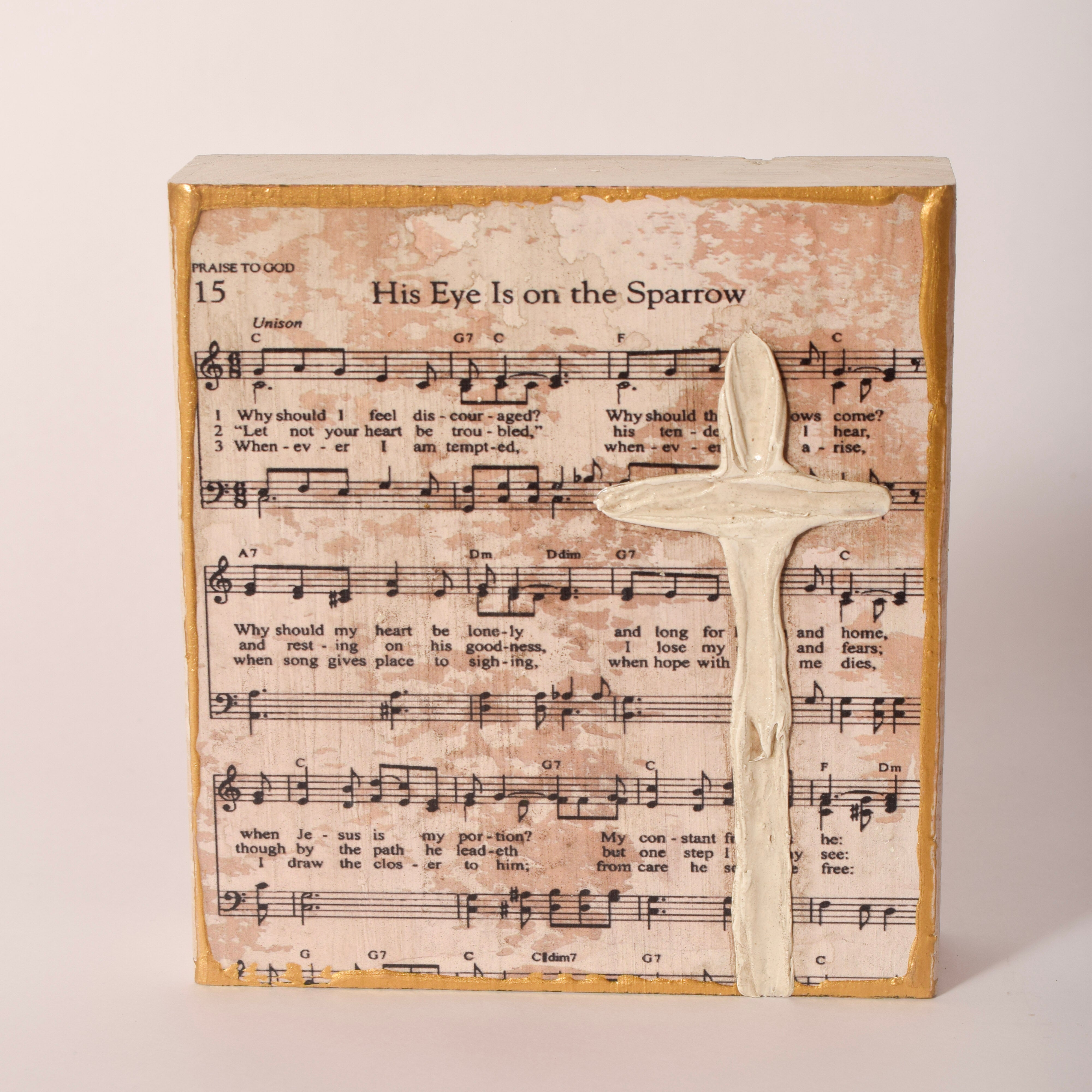 Hand-painted wooden hymn and cross block, 6 by 6 inches, sold at Thistles in Pella, Iowa