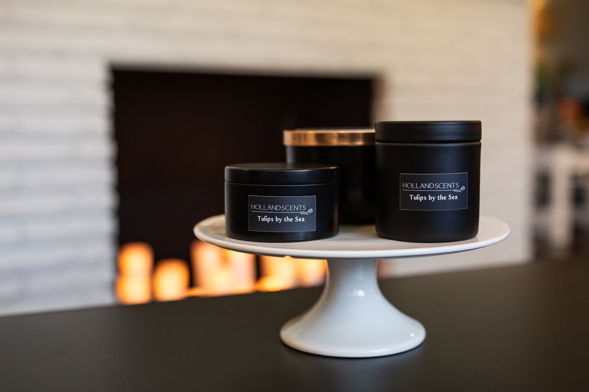 Holland Scents Tulips by the Sea soy candle in three sizes displayed on a cake stand, Pella, Iowa