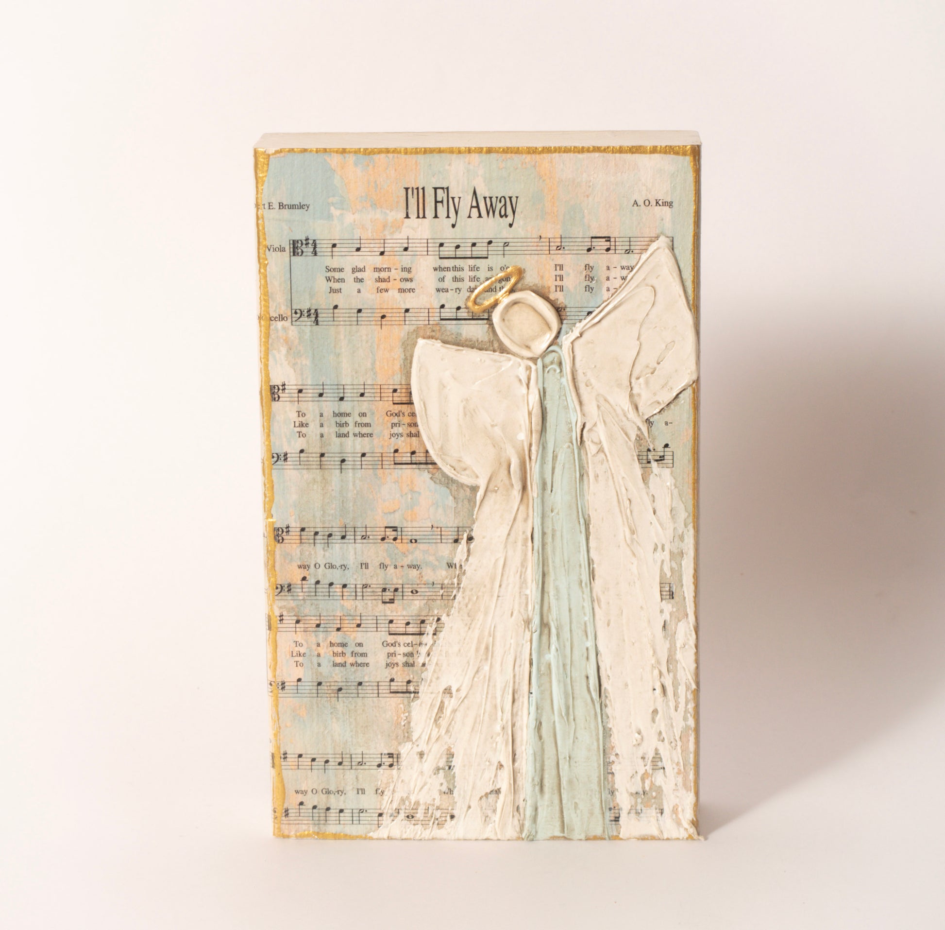 A larger hand-painted wooden block featuring a hymn paired with an angel design, perfect for a mantel, shelf, or entryway table. Each piece is one-of-a-kind.