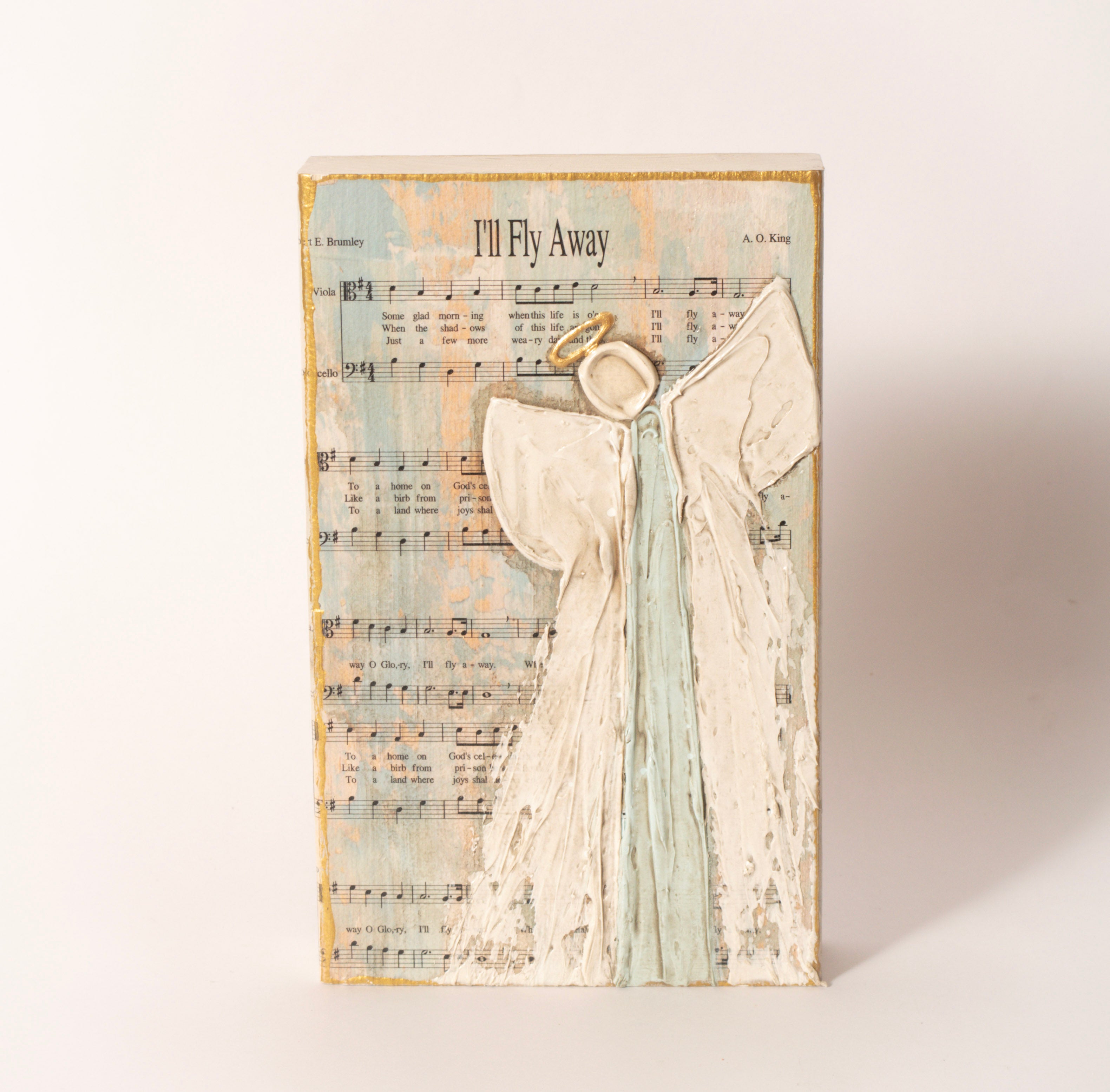 A larger hand-painted wooden block featuring a hymn paired with an angel design, perfect for a mantel, shelf, or entryway table. Each piece is one-of-a-kind.