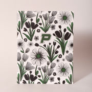 Green and gray Dutch floral notebook with dotted pages, designed for Thistles in Pella, Iowa