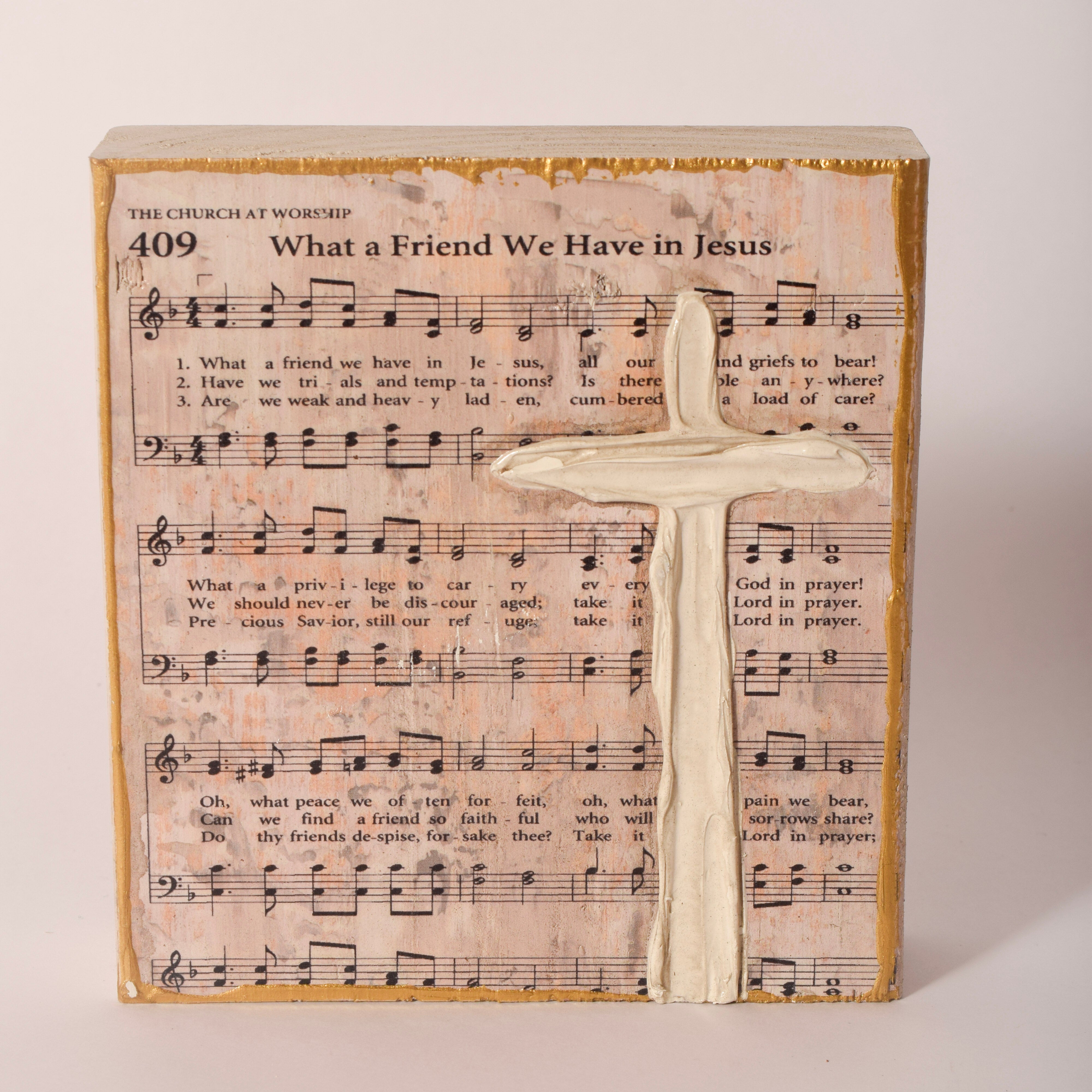 Hand-painted wooden hymn and cross block, 6 by 6 inches, sold at Thistles in Pella, Iowa