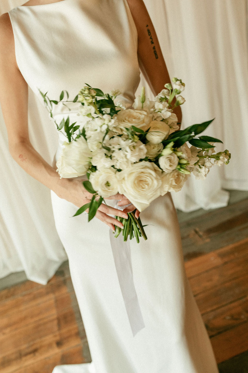 White bridal bouquet at Tamory Hall, Pella, Iowa