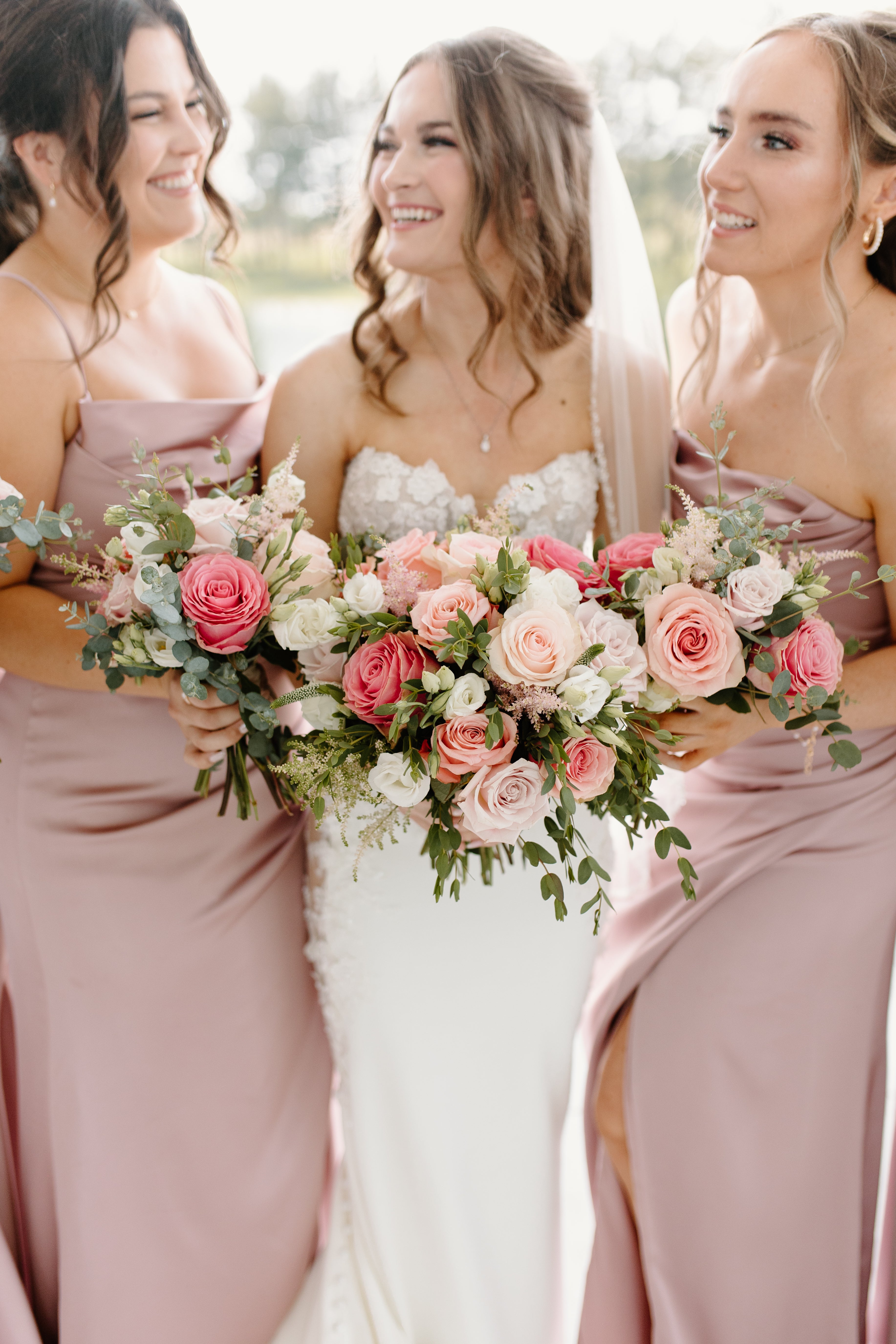 Pink, white, and green wedding florals with bridal bouquet and bridesmaids' bouquets, Pella, Iowa