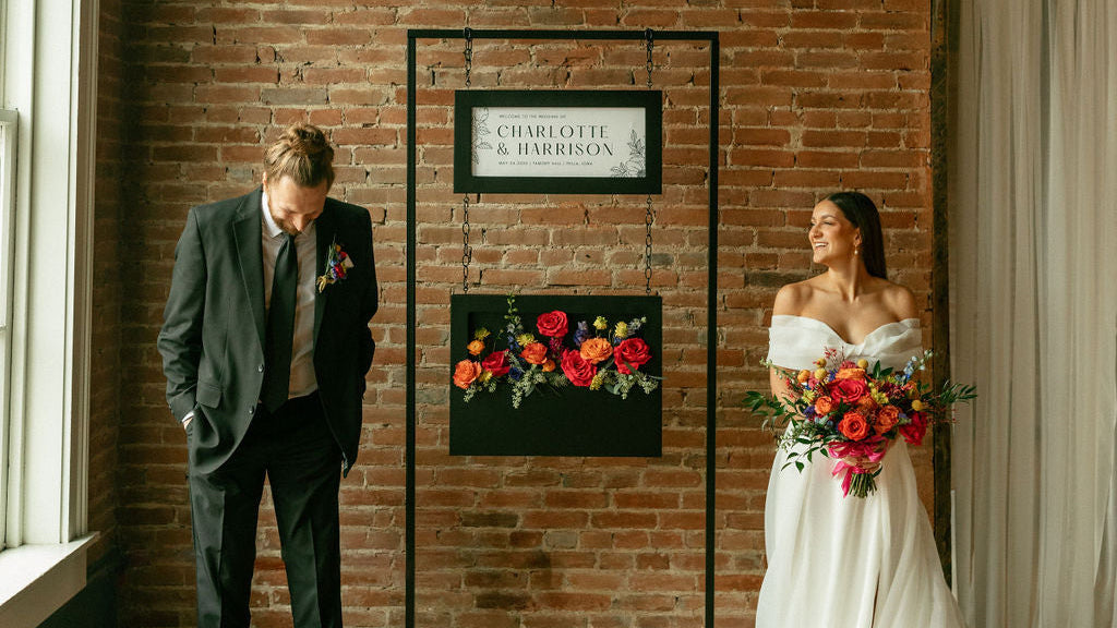 Customized wedding welcome sign displayed at ceremony with bride and groom, Pella, Iowa