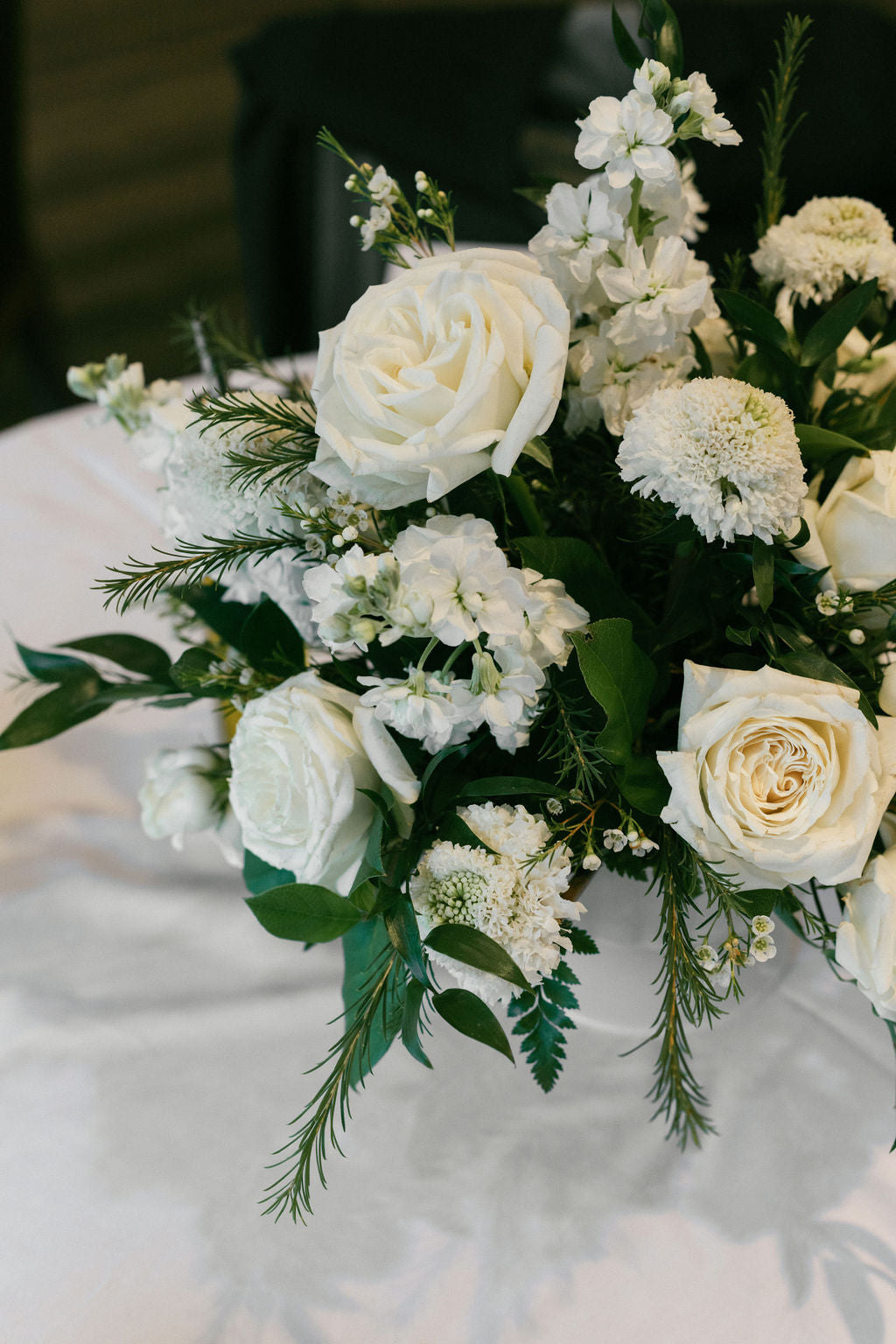 Green and white compote floral decor for wedding reception, Pella, Iowa